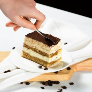 hand, tiramisu, cake, coffee, table, tiramisu, tiramisu, tiramisu, tiramisu, tiramisu